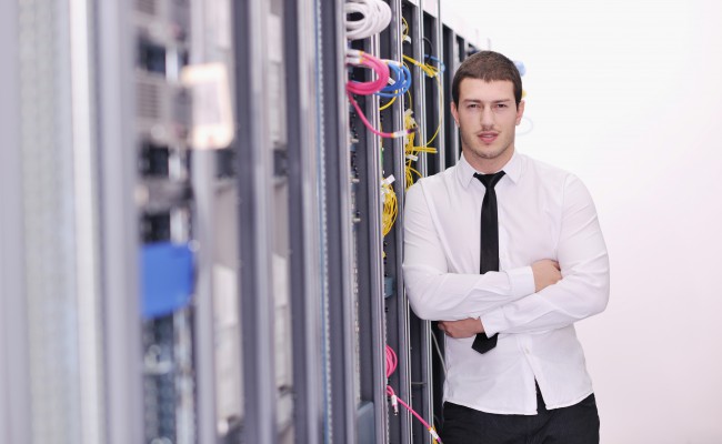 young it engeneer in datacenter server room